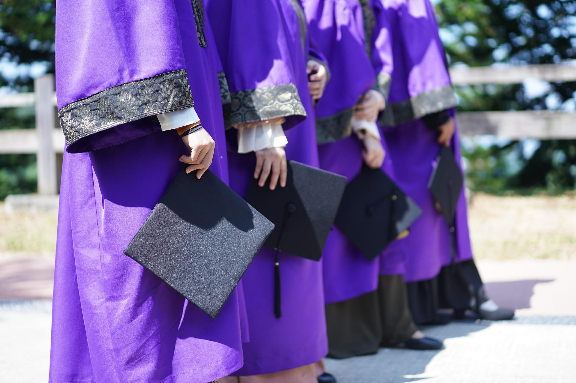 Graduate embracing family